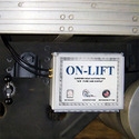 ON-LIFT module mounted on the underside of a semi trailer.